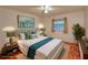 Bright bedroom featuring a queen bed, soft natural light and a tranquil blue color scheme at 1181 Church St # D, Decatur, GA 30030