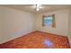Bright bedroom featuring hardwood flooring and a large window with ample natural light at 1181 Church St # D, Decatur, GA 30030