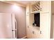 White kitchen with cabinetry including wine rack and counter space at 1181 Church St # D, Decatur, GA 30030