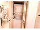 A stacked washer and dryer are conveniently located near the bathroom at 1181 Church St # D, Decatur, GA 30030