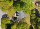 Aerial view of home with mature trees and expansive yard at 3200 Hampton Ridge Way, Snellville, GA 30078