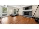 Finished basement with fireplace, laminate flooring, and plenty of natural light at 3200 Hampton Ridge Way, Snellville, GA 30078