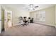 Bright bedroom with a ceiling fan that can be used as an office space at 3200 Hampton Ridge Way, Snellville, GA 30078