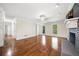 Large living room with hardwood floors and a decorative fireplace at 3200 Hampton Ridge Way, Snellville, GA 30078