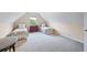 Cozy bedroom featuring twin beds, neutral decor, and natural light at 3601 Cedar Springs Ln, Loganville, GA 30052