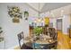 Dining area with pendant lights and a glass table at 3601 Cedar Springs Ln, Loganville, GA 30052