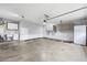 Spacious garage with storage cabinets, utility sink, and room for multiple vehicles at 3601 Cedar Springs Ln, Loganville, GA 30052