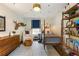 A lovely room featuring a four-poster bed, decor, and hardwood floors at 568 Timberland Dr, Atlanta, GA 30342