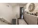 Upstairs hallway with hardwood floors and console table at 568 Timberland Dr, Atlanta, GA 30342