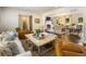 Inviting living space with a fireplace, comfortable seating, and easy access to the outdoors at 568 Timberland Dr, Atlanta, GA 30342