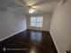 Bedroom with wood floors and a ceiling fan at 7030 Bennington Ln, Cumming, GA 30041