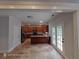 Eat-in kitchen with granite countertops and stainless steel appliances at 7030 Bennington Ln, Cumming, GA 30041