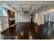 Spacious living room boasts coffered ceilings and a stone fireplace at 7030 Bennington Ln, Cumming, GA 30041