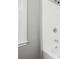 Clean, modern bathroom features a white tiled shower, and updated fixtures at 1870 Oak Valley Rd, Decatur, GA 30035