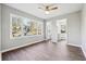 Light-filled bedroom with large windows and a ceiling fan for added comfort at 1870 Oak Valley Rd, Decatur, GA 30035