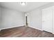 This bedroom features hardwood floors, neutral walls, and ample closet space at 1870 Oak Valley Rd, Decatur, GA 30035