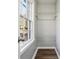 Walk-in closet offering ample storage with built-in wire shelving and a window at 1870 Oak Valley Rd, Decatur, GA 30035