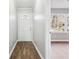 Inviting entryway with a stylish front door and wood flooring, leading into a bright living space at 1870 Oak Valley Rd, Decatur, GA 30035
