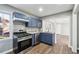 Updated kitchen with granite counters, stainless appliances, and freshly painted cabinets at 1870 Oak Valley Rd, Decatur, GA 30035