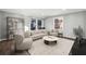 Bright living room features a modern sofa, stylish decor, and an open layout at 1870 Oak Valley Rd, Decatur, GA 30035