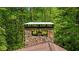 Stone chimney with a unique design, offering a rustic yet modern appeal at 2208 Guinevere Ne Way, Atlanta, GA 30345