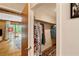Well-organized walk-in closet adjacent to bedroom with wood floors and ample hanging space at 2208 Guinevere Ne Way, Atlanta, GA 30345