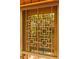 A unique decorative metalwork adorns the secure and stylish front door, adding an artistic touch to the home's entrance at 2208 Guinevere Ne Way, Atlanta, GA 30345