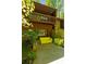 A charming home showcasing an exterior stone accent wall and a deck overlooking the well landscaped yard at 2208 Guinevere Ne Way, Atlanta, GA 30345