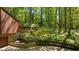 Landscaped backyard with a split-level patio, offering a serene outdoor experience at 2208 Guinevere Ne Way, Atlanta, GA 30345