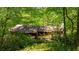 Charming home nestled among lush trees, offering privacy and natural beauty at 2208 Guinevere Ne Way, Atlanta, GA 30345