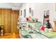 Bright living room featuring wall mounted display shelves and glasswares at 2208 Guinevere Ne Way, Atlanta, GA 30345