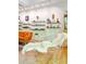 Bright living room featuring modern track lighting and wall-mounted display shelves at 2208 Guinevere Ne Way, Atlanta, GA 30345