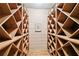 Spacious wine cellar with extensive wooden shelving and a framed photo at 2208 Guinevere Ne Way, Atlanta, GA 30345