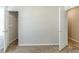 Bedroom with carpet, a closet, and two doors at 4357 James Wade Dr, Snellville, GA 30039