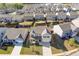 Aerial view of the community showcasing the home's location and surrounding neighborhood at 81 Creekside Bluff Way, Auburn, GA 30011