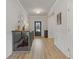 Stylish hallway showcasing hardwood floors and decorative accents at 81 Creekside Bluff Way, Auburn, GA 30011