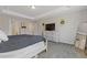 Beautiful main bedroom with tray ceiling, and abundant storage with dresser at 81 Creekside Bluff Way, Auburn, GA 30011