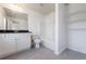 Bathroom with a vanity, a tile floor, and combined tub and shower at 8475 Douglass Trl, Jonesboro, GA 30236