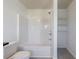 Bathroom featuring a shower-tub combo and white shelving at 8475 Douglass Trl, Jonesboro, GA 30236