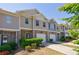 Charming townhome exterior with brick accents, neutral siding, and attached garage at 8475 Douglass Trl, Jonesboro, GA 30236