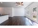 Bright living room with hardwood floors and views of the backyard at 8475 Douglass Trl, Jonesboro, GA 30236