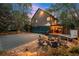Backyard oasis featuring a basketball court, fire pit, hot tub, and inviting seating for outdoor fun and relaxation at 3749 Watkins Ne Pl, Brookhaven, GA 30319