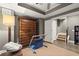 Versatile bonus room with hardwood floors, closet space, and a large cabinet for storage and fitness activities at 3749 Watkins Ne Pl, Brookhaven, GA 30319
