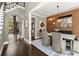 Dining area with dark wood floors, large picture window and designer lighting is the perfect space for entertaining at 3749 Watkins Ne Pl, Brookhaven, GA 30319