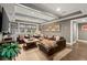 Comfortable living room with leather furniture, recessed lighting, and built-in bookshelves for a cozy and inviting atmosphere at 3749 Watkins Ne Pl, Brookhaven, GA 30319