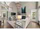 Open-concept living room featuring a fireplace, hardwood floors, and a staircase at 3749 Watkins Ne Pl, Brookhaven, GA 30319