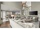 Cozy living room flowing into a dining area and kitchen creates an inviting space at 3749 Watkins Ne Pl, Brookhaven, GA 30319