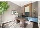 Stylish office with a built-in desk, custom cabinetry, hardwood floors, and sophisticated decor for productivity at 3749 Watkins Ne Pl, Brookhaven, GA 30319