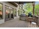 A spacious outdoor kitchen features a built-in grill and stainless steel appliances, perfect for entertaining at 3749 Watkins Ne Pl, Brookhaven, GA 30319