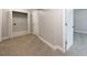 Spacious basement area with neutral carpet at 5287 Chantilly Ter, Atlanta, GA 30349
